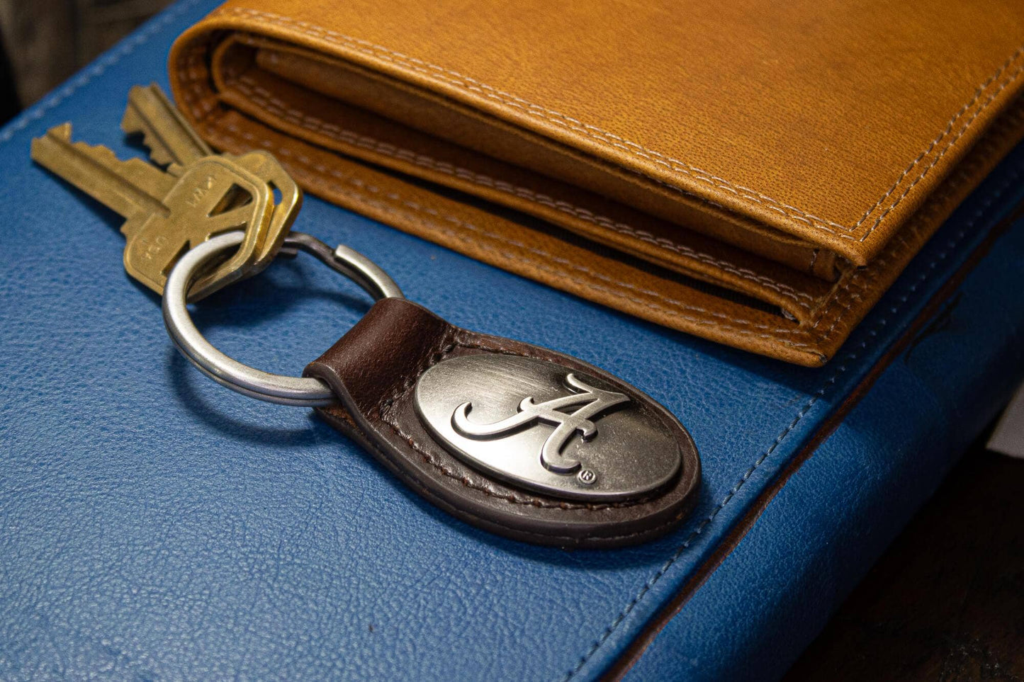 Alabama Crimson Pride Oval Leather Key Fob.